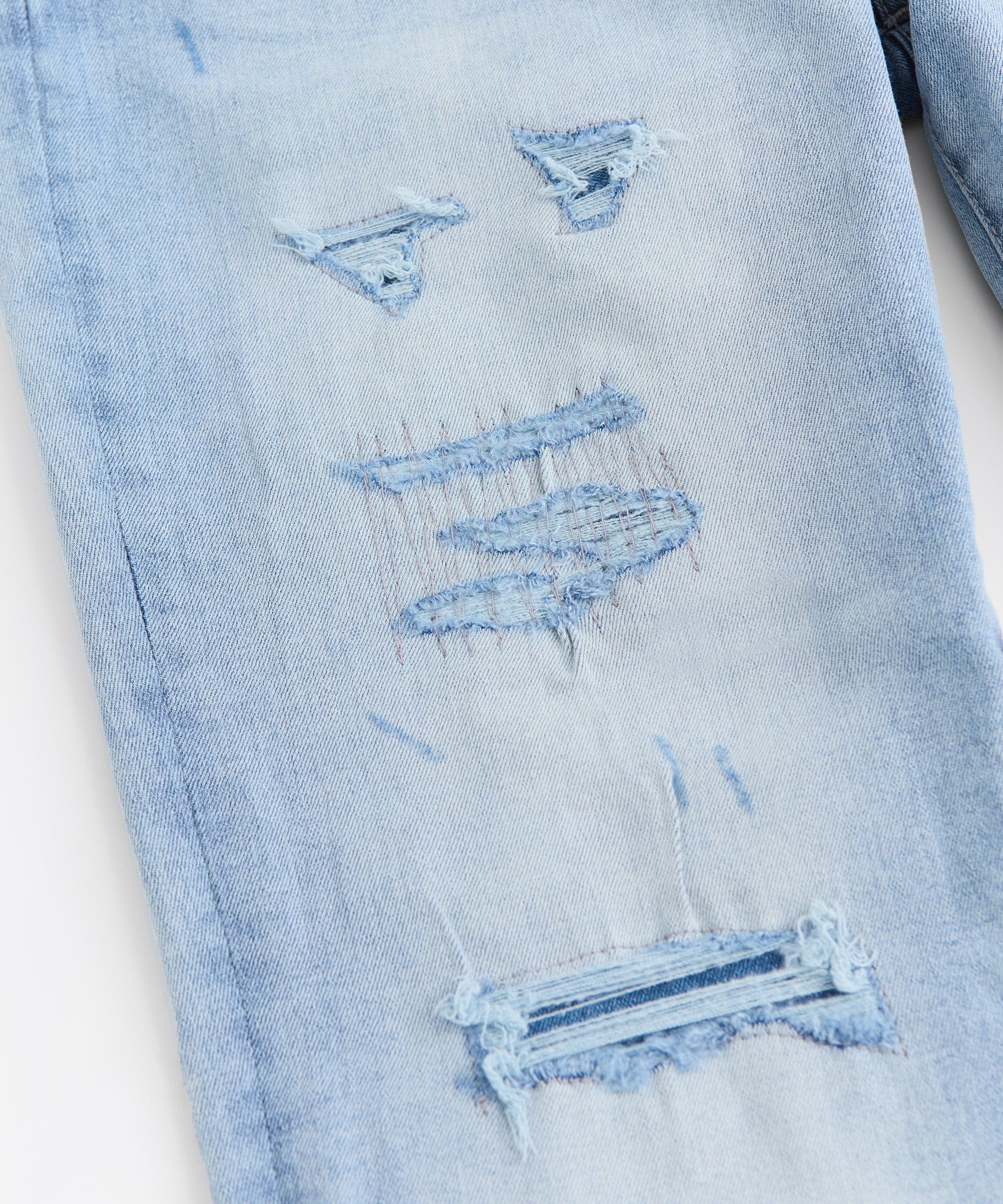 Ripped And Repaired Washed Denim Jeans - Light Blue - Image 4