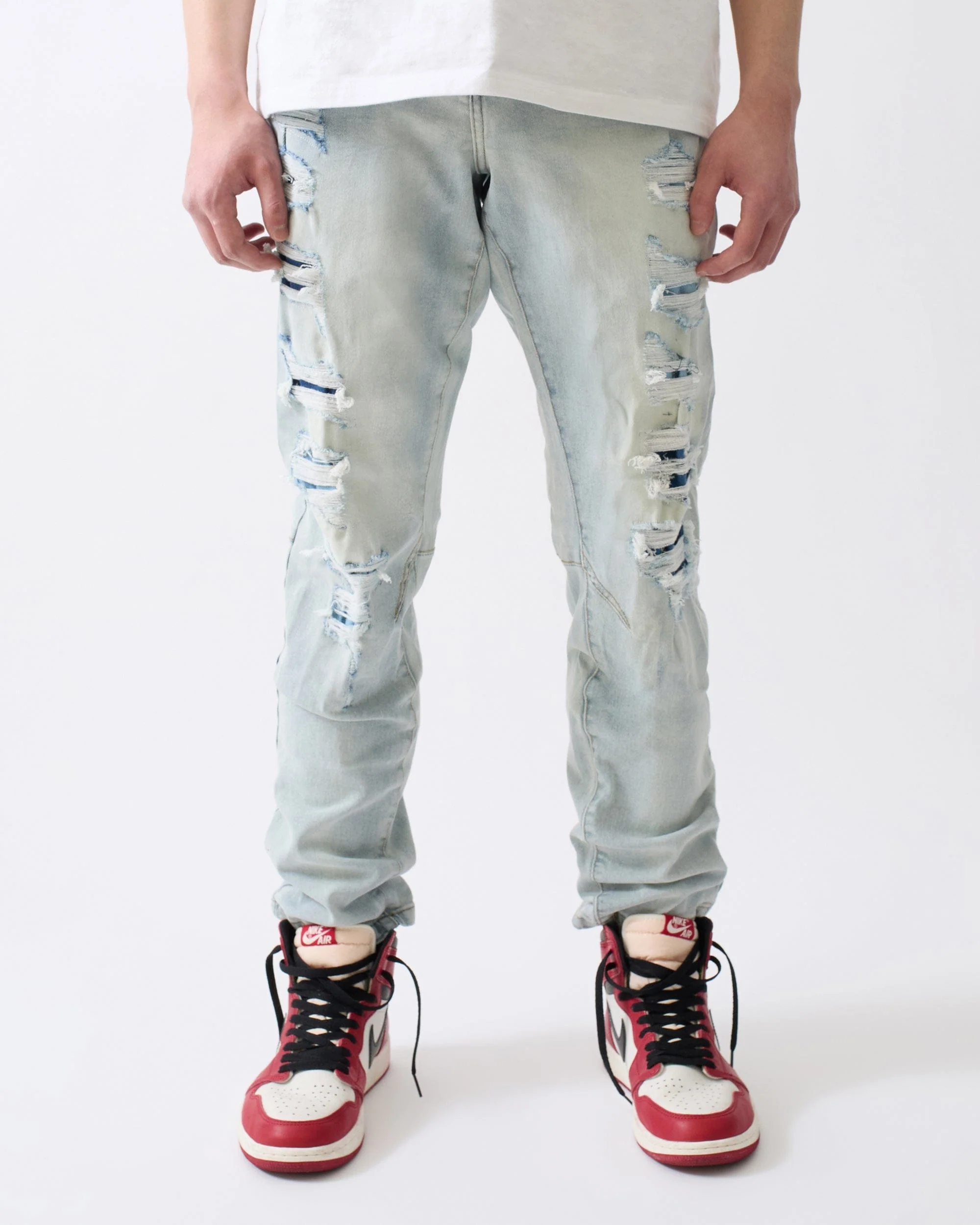 Ripped And Repaired Denim Jeans - Light Blue