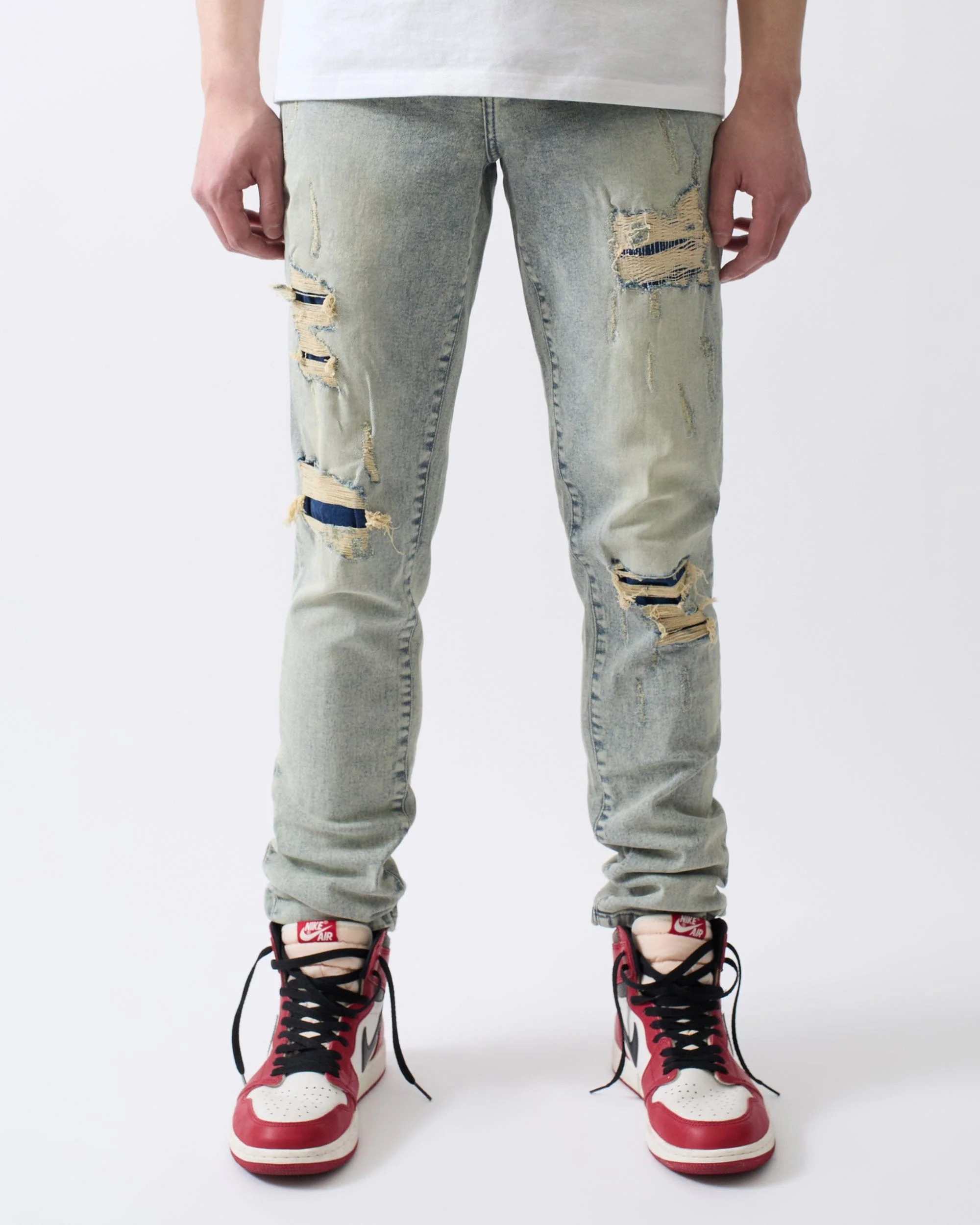 Ripped And Repaired Denim Jeans - Blue